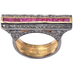 Ring with Channel-Set Rubies and Pave Set Diamonds