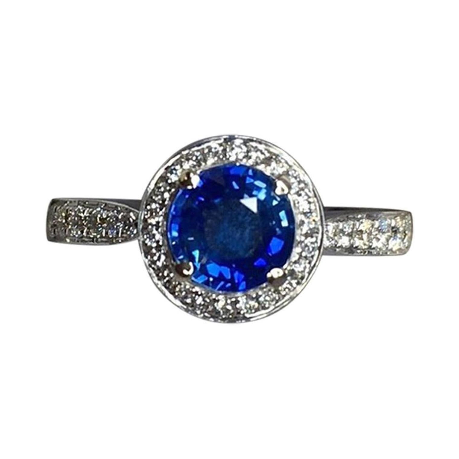 1.30 Carat Ceylon Blue Sapphire and Diamond Halo Ring 18 Karat White Gold