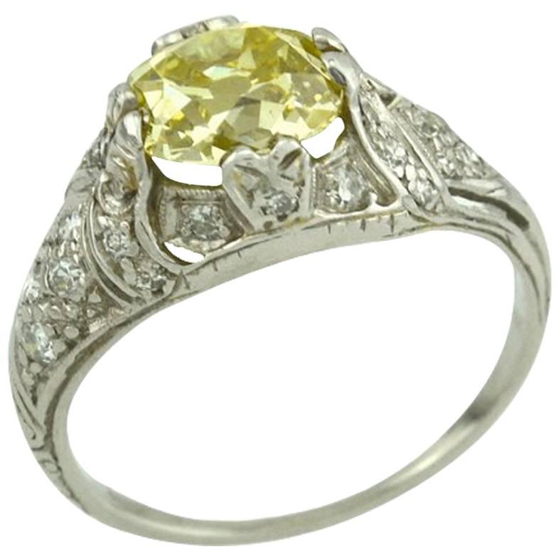 1.61 Carat GIA Natural Fancy Yellow Old Mine Cut Diamond and Platinum Ring For Sale