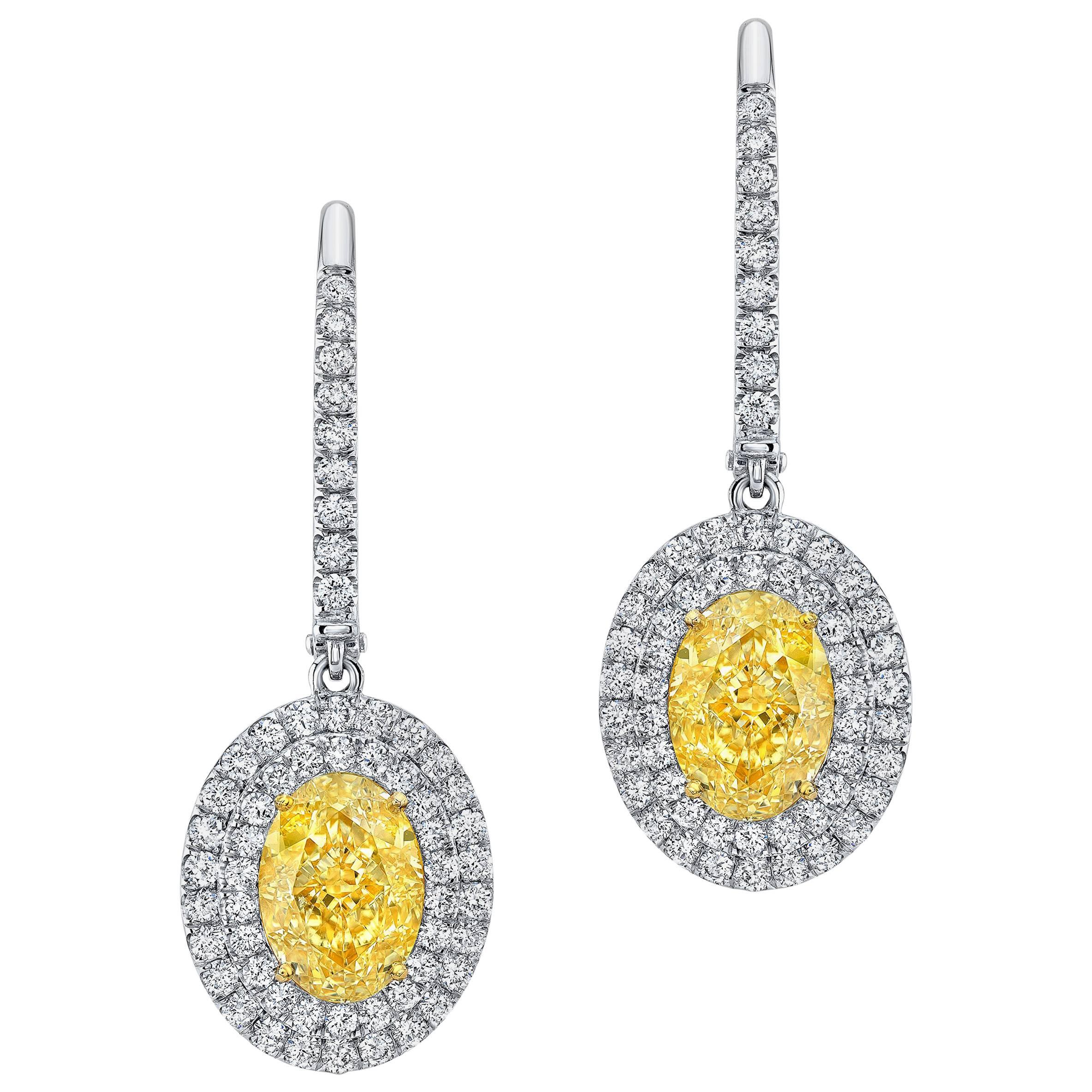 GIA Certified 4.07 Carat Light Yellow Diamond White Gold Earrings