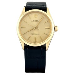 Rolex Oyster Perpetual 1002 34mm Champagne Dial 14k Yellow Gold