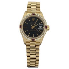 Rolex President Datejust pour femme 6917, cadran noir, or 18 carats, lunette sertie de diamants et de rubis