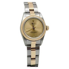 Rolex Ladies Oyster Perpetual 76243 24mm Champagne Dial 18K Yellow Gold Steel