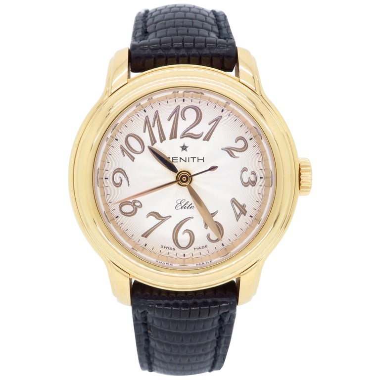 elite ladies gold tone watch