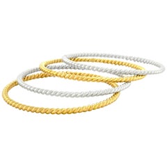 Bucherer Set of Four Cable Twist Gold Bangles