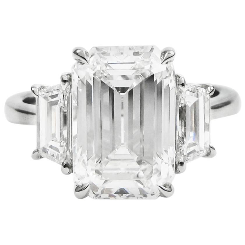 GIA Certified 5.21 Carat Total Emerald Cut Three-Stone Diamond Platinum Ring