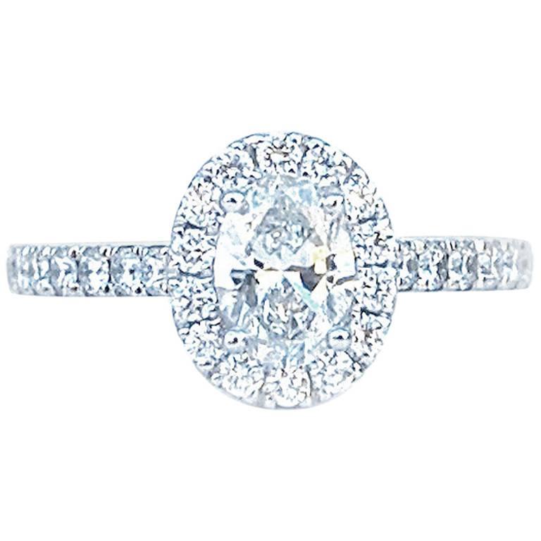 GIA Certified 0.70 Carat Oval Cut Diamond Engagement Ring For Sale