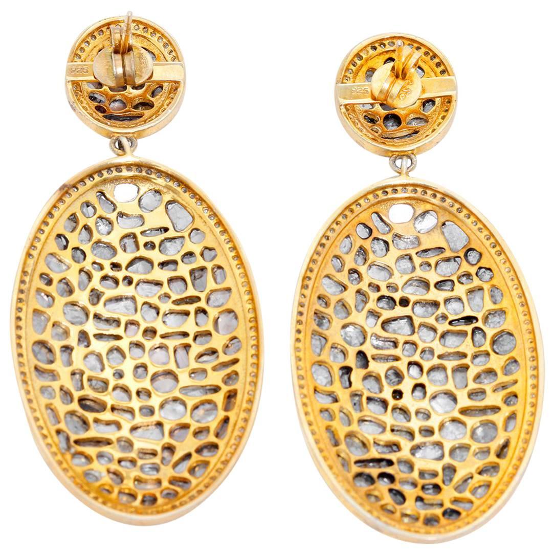 14K Gold plated Sliced Pave Diamond Earrings - . Sliced oval shaped Pave diamond earrings. Back and  post are 14K yellow gold, the rest of the earrings are blackened silver. Diamond weight 7.5 cts. 2.5 inches long and 1 inch wide. Total weight 24.3