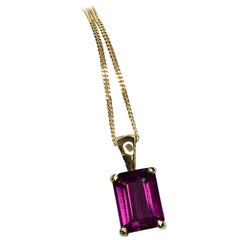 2.02 Carat Neon Purple Rhodolite Malawi Garnet Pendant 18 Karat Gold Emerald Cut