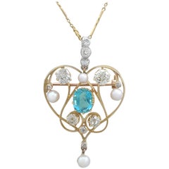 1890s Diamond and Aquamarine, Pearl and 18 Karat Yellow Gold Pendant / Brooch