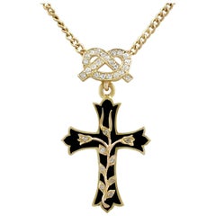 1890s Victorian 0.57 Carat Diamond and Onyx, 21 Carat Yellow Gold Cross Pendant