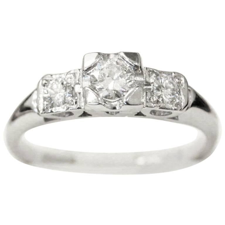 Three-Stone Diamond Platinum Past Present Future Engagement Ring For Sale