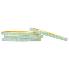 Set of Four 18 Karat Yellow Gold and Blue Enamel Bangle Bracelets