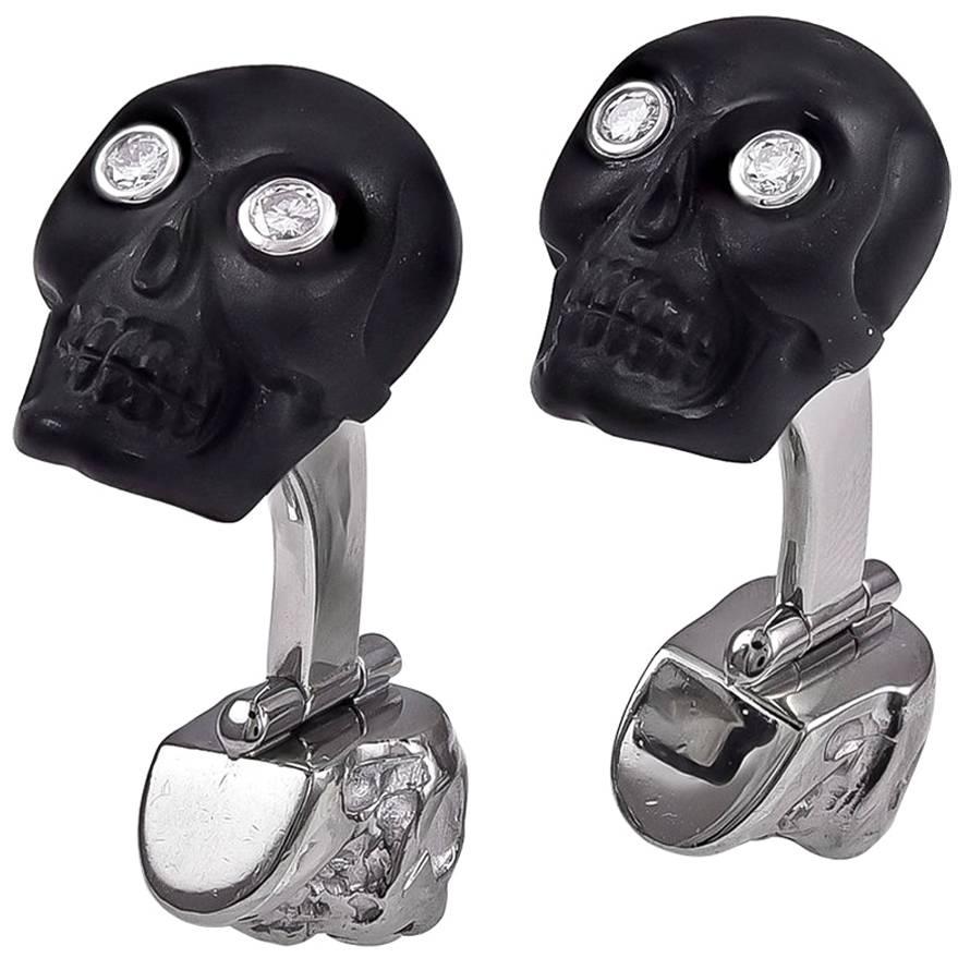 White Gold Onyx Diamond and Ruby Skull Cufflinks For Sale