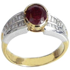 Ring mit ovalem Rubin 1,83 und Diamanten im Baguetteschliff 0,82, um 1960