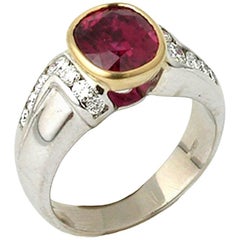 Vintage Oval Shape Natural Ruby 3.37 with Round Diamonds 0.50 Ring, circa 1960