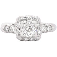 Art Deco 0.65 Carat Diamond Halo Engagement Ring in Platinum