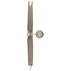 Vintage Movado White and Yellow Gold Diamond Dangling Wristwatch, circa 1960s