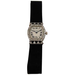 Cartier Platinum Rose Gold Diamond Art Deco Cocktail Wristwatch, circa 1920s