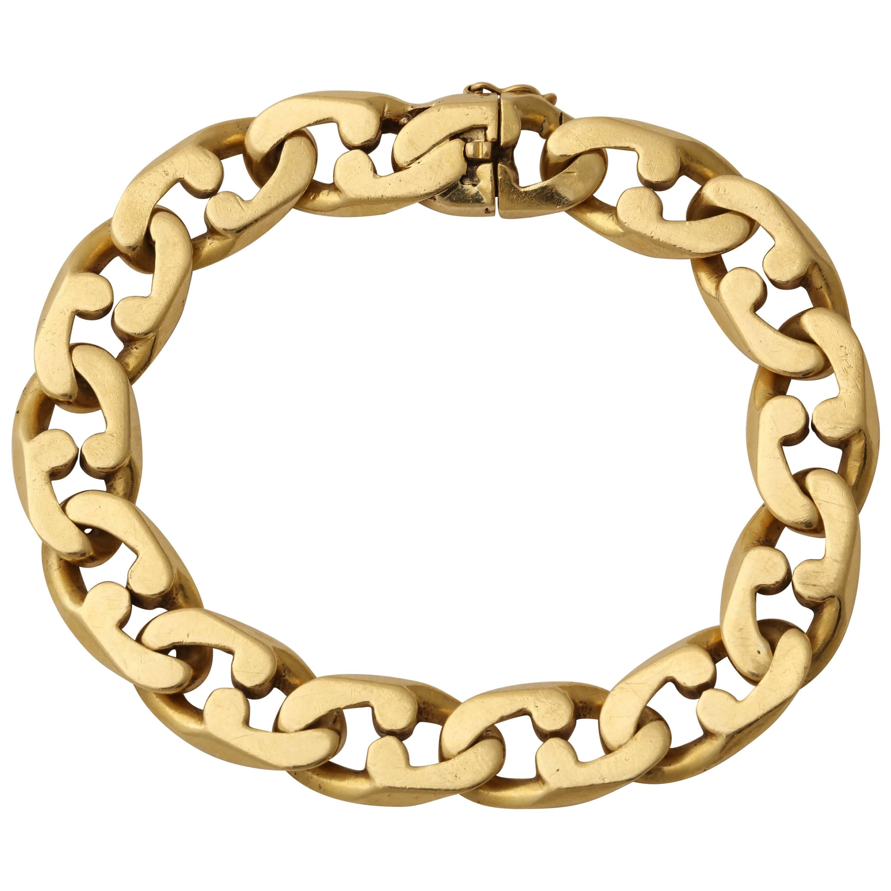 1980s Tiffany & Co. Interlocking Jagged Curb Link Gold Unisex Flexible Bracelet