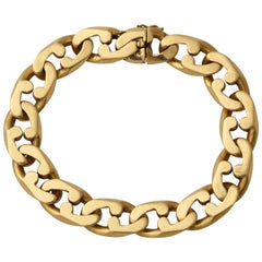 1980s Tiffany & Co. Interlocking Jagged Curb Link Gold Unisex Flexible Bracelet