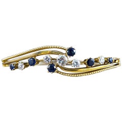 Antique Edwardian Diamond and Sapphire Bangle Bracelet in 15 Carat Gold