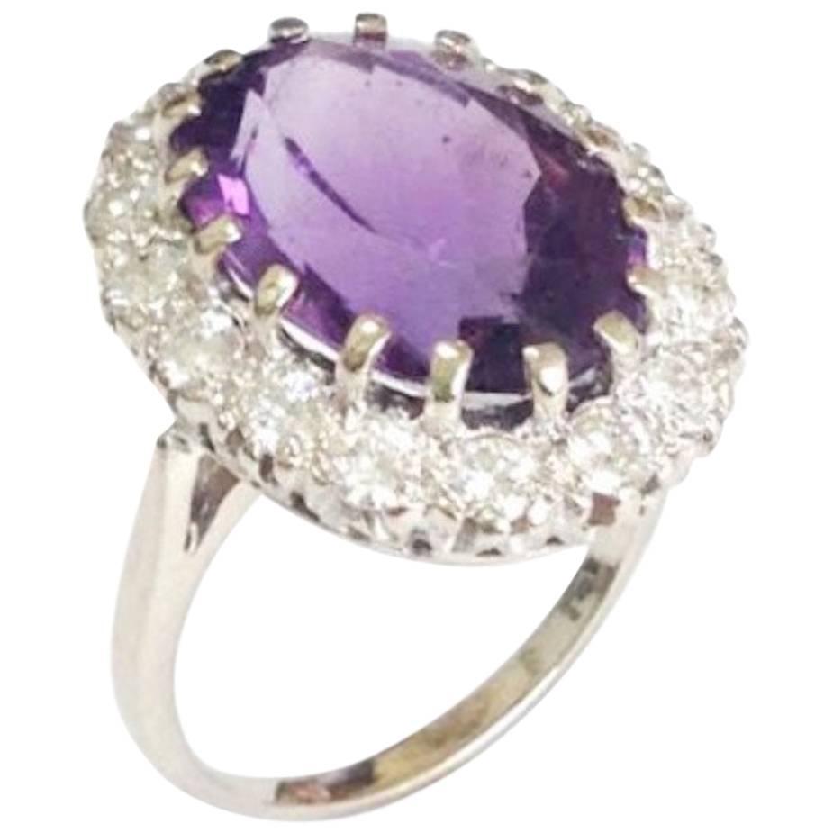 Striking 1950s 10 Carat Amethyst and 1.00 Carat VS Diamond Cocktail Ring For Sale