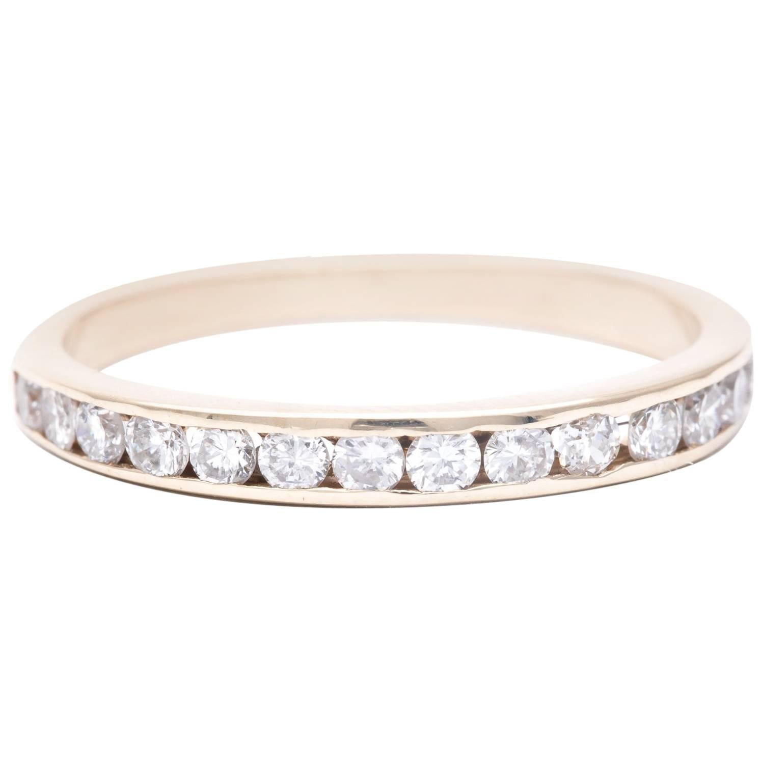 Channel Set Diamond Wedding Band in Yellow Gold For Sale