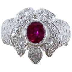 Anello in platino con diamante e rubino