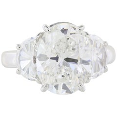 GIA 4.12 Carat G/SI1 Oval Three-Stone Diamond Platinum Engagement Ring