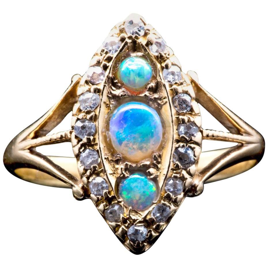 Opal and Diamond Trilogy Ring in 18 Karat Yellow Gold For Sale