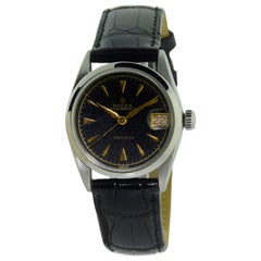 Vintage Rolex Stainless Steel three quarter Size Black Dial Early Oyster Date Watch