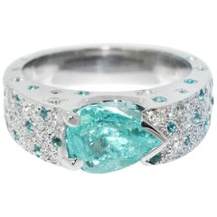Lizunova One-of-a-Kind Paraiba Tourmaline
Diamond Ring in 18 Karat White Gold Lizunova One-of-a-Kind Paraiba Tourmaline
Diamond Ring in 18 Karat White Gold