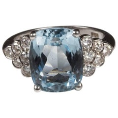 White Gold Blue Topaz and Diamond Dress Ring