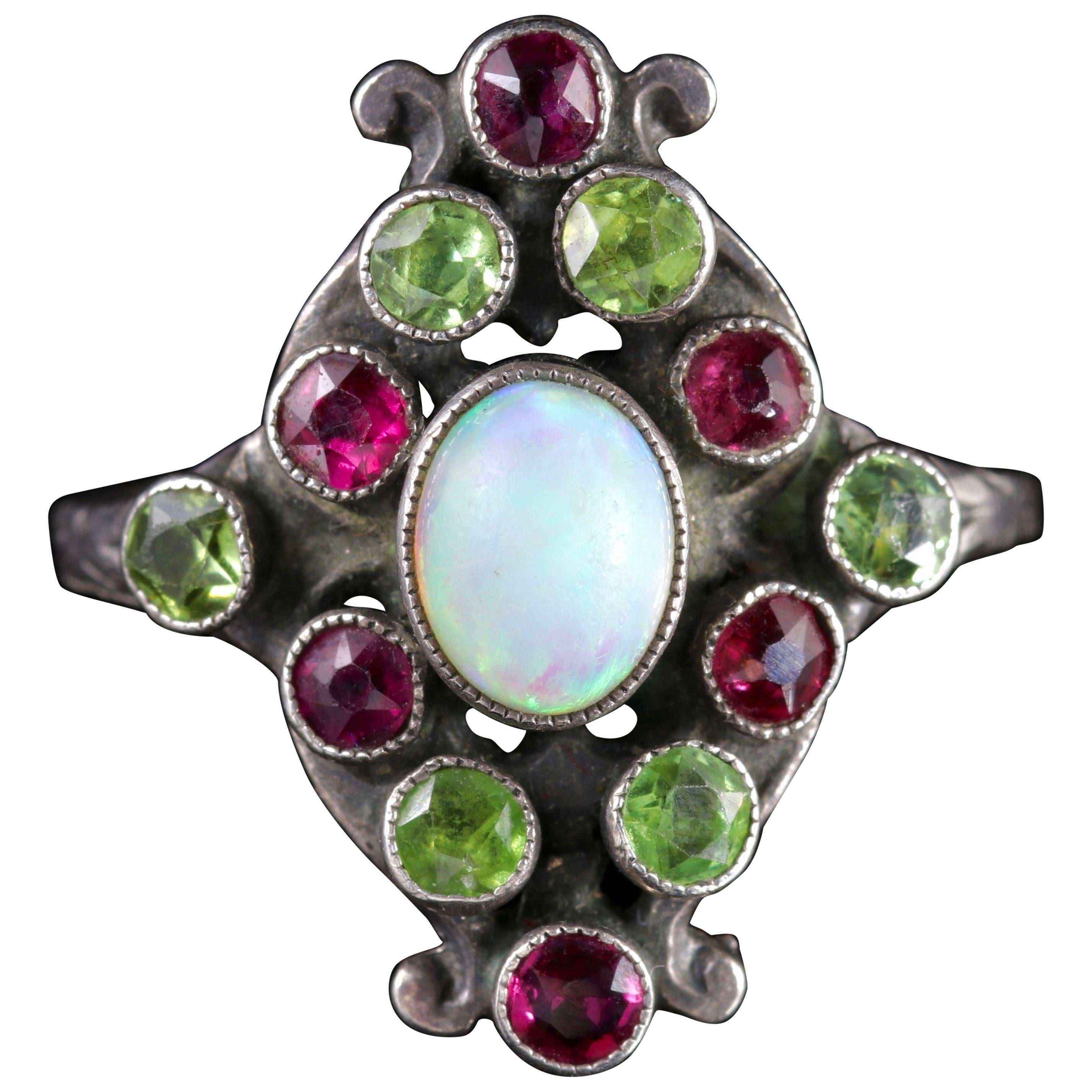 Arts & Crafts Peridot Ruby Opal Ring, circa 1900
