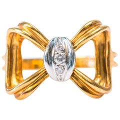 1980s Tiffany & Co. Diamond, Platinum and 18K Gold Bow Ring