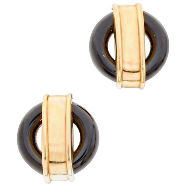 Circa 1970 Pair of 18 Karat Gold Onyx  Earrings Cartier by Aldo Cipullo For Sale