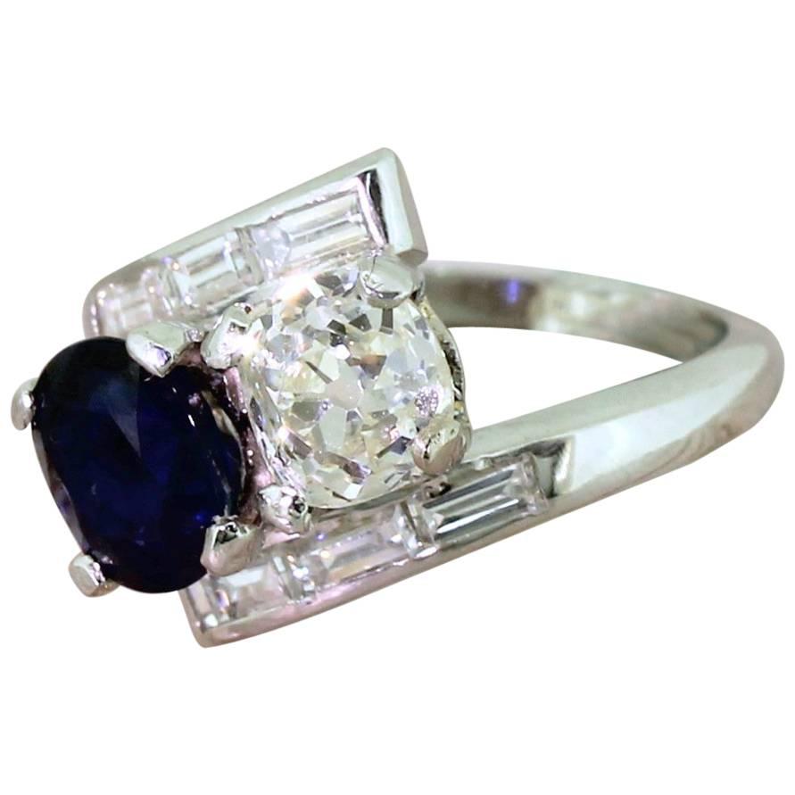 Art Deco 1.33 Carat Old Cut Diamond and 1.40 Carat Sapphire Crossover Ring For Sale