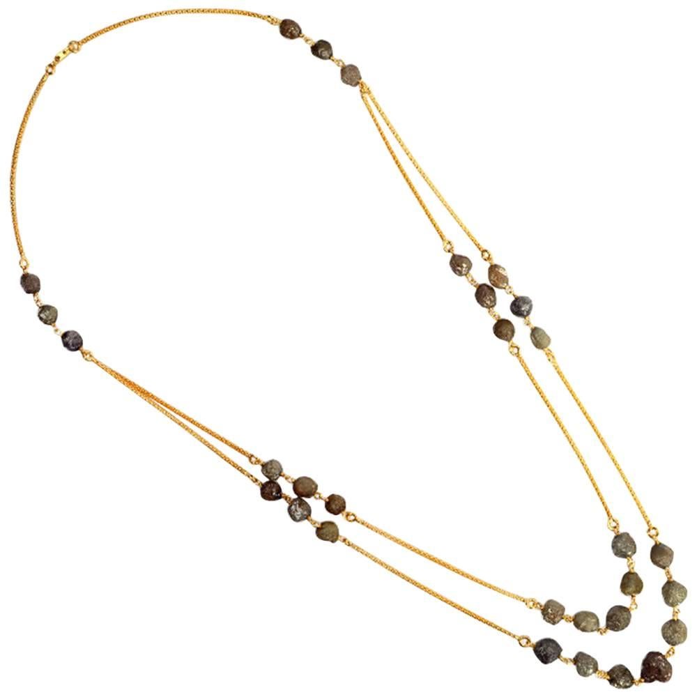 Diamant-Halskette aus 18 Karat Gelbgold mit Rohdiamant