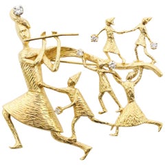 1970s Peter Lindeman 18 Karat Yellow Gold and Diamond Pied Piper Brooch