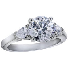 Round Brilliant Diamond Platinum Three-Stone Engagement Ring