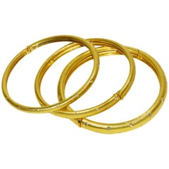 Vintage Set of Three Paul Morelli Gold and Diamond Bangle Bracelets