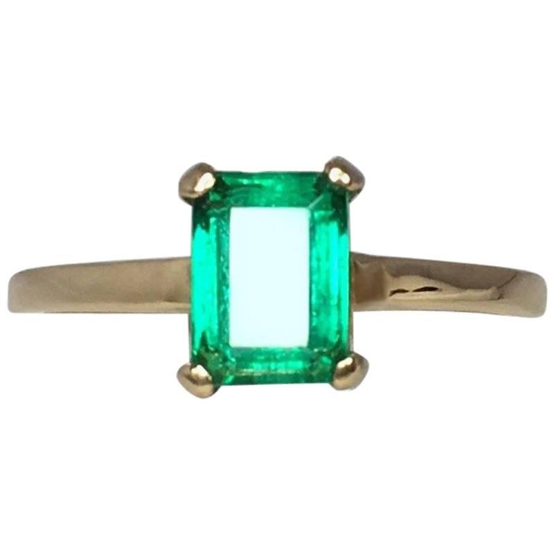 emerald solitaire ring