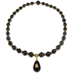 Retro Hematite Beads Necklace in 18 Karat Gold and White Diamonds