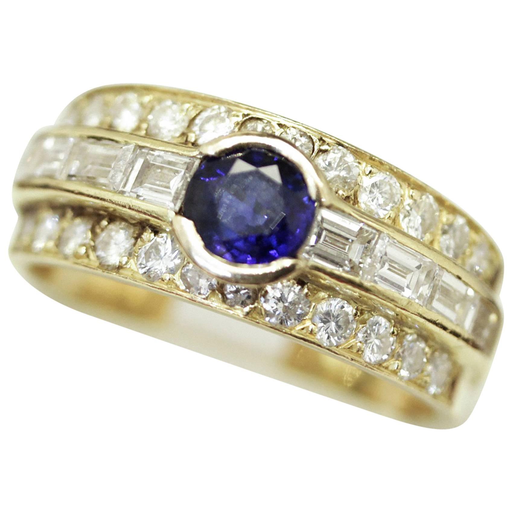 18 Carat Yellow Gold Blue Sapphire Ring For Sale