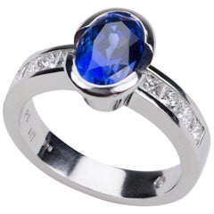 Platinum Blue Sapphire Princess Cut Diamonds Engagement Ring