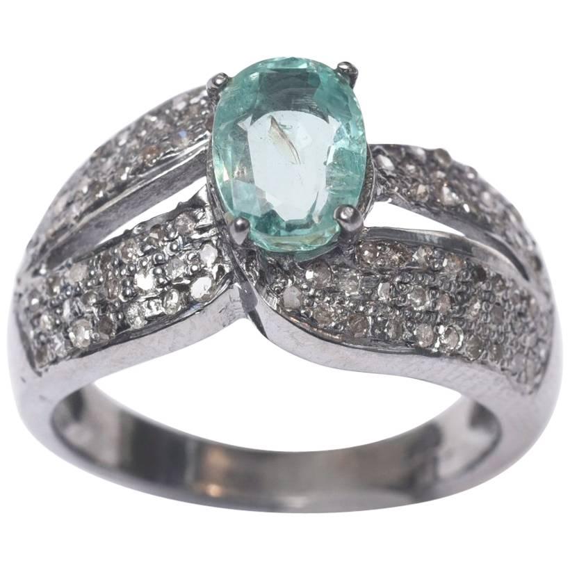 Faceted Aquamarine and Diamond Ring