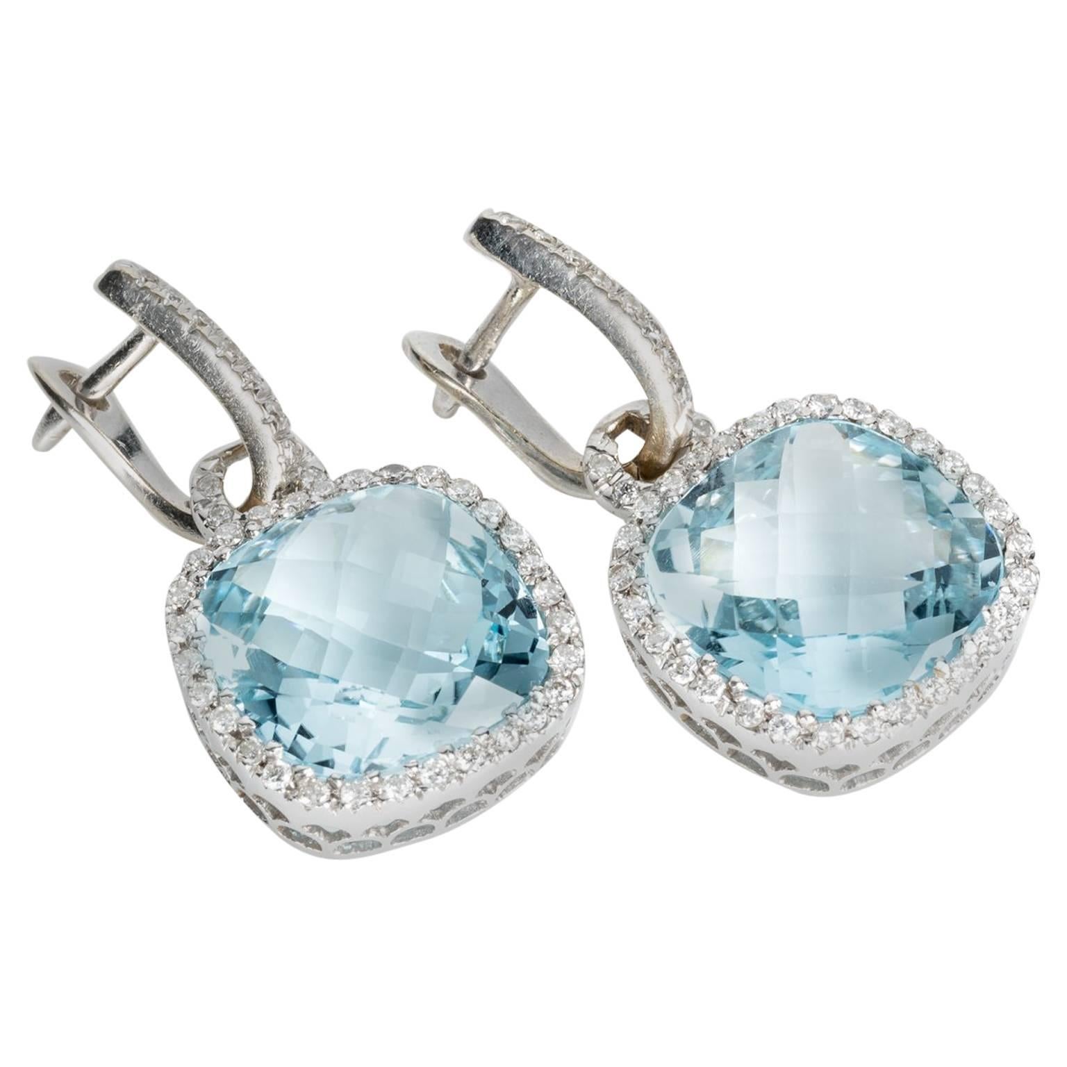 Blue Topaz and Diamond 18 Karat White Gold Halo Style Drop Earrings