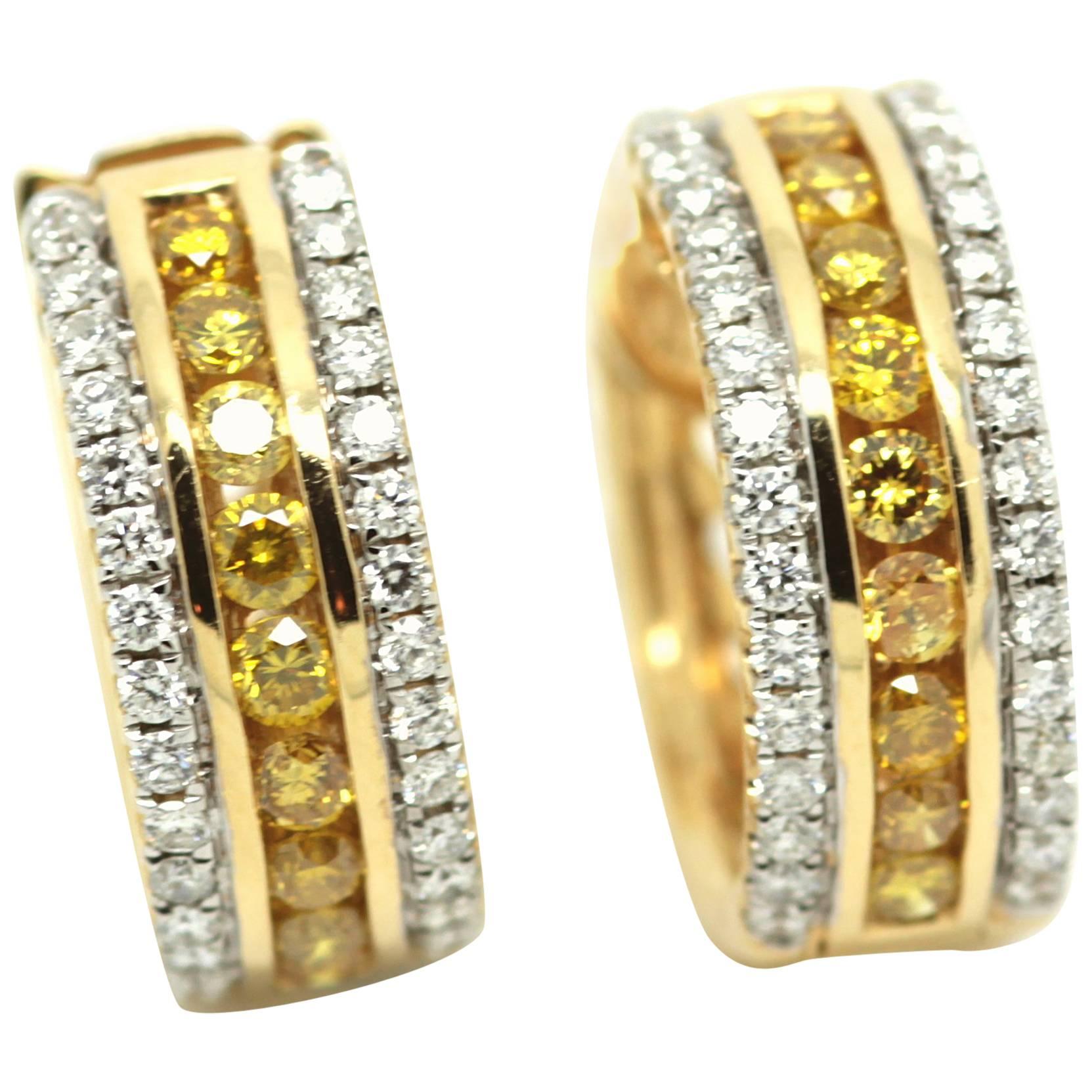 Circular 1.62 Carat Fancy Yellow and White Diamond Earrings For Sale