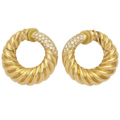 Van Cleef & Arpels Boucles d'oreilles en or avec diamants et Clips